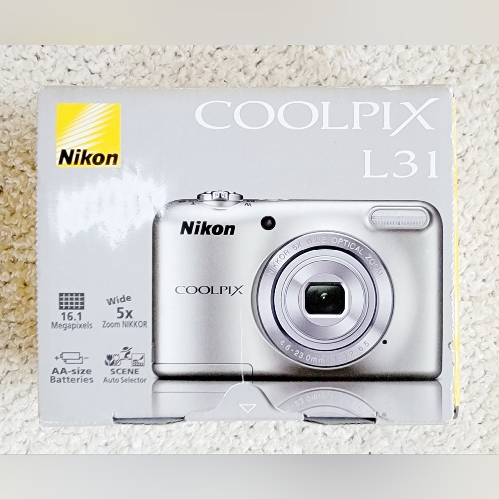 Nikon Coolpix L31 16 mega pixels 5X zoom. Like New in original Box.
